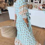 MANA | MIDILANGE CHIQUE FLORALEN JURK MET V-HALS